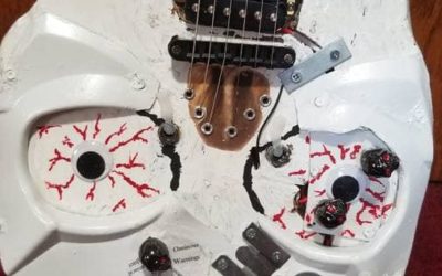 The Googly-Eyed and Toothless Skeleton in the Guitar Closet