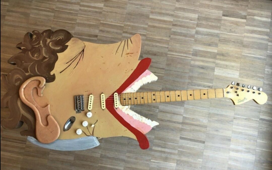 The Guitar That Eats Bad Notes: The Human Face Guitar