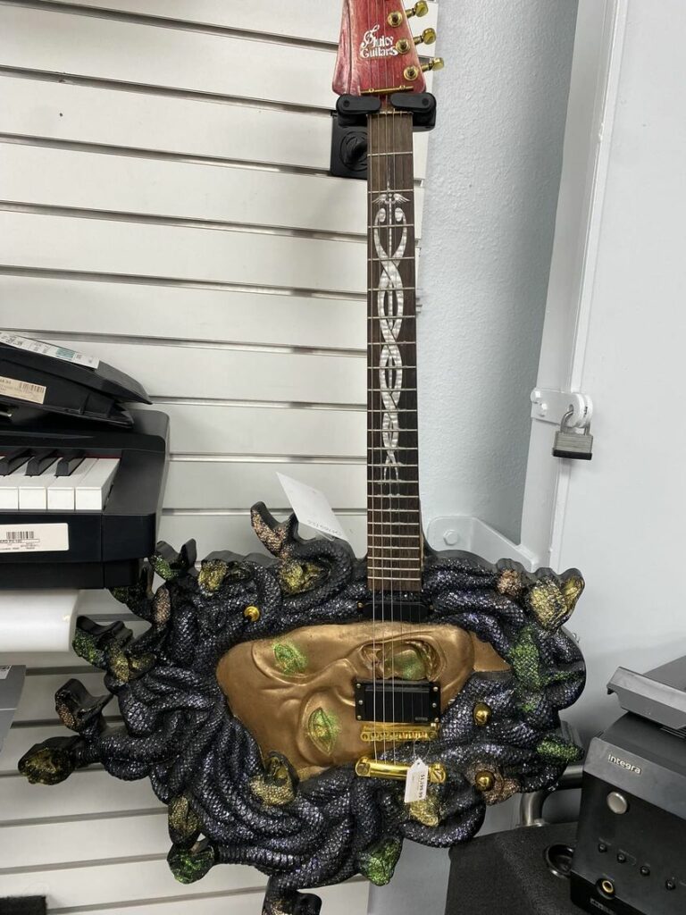 Get a Grip on the Gorgon Guitar with a Stone-Cold Stare