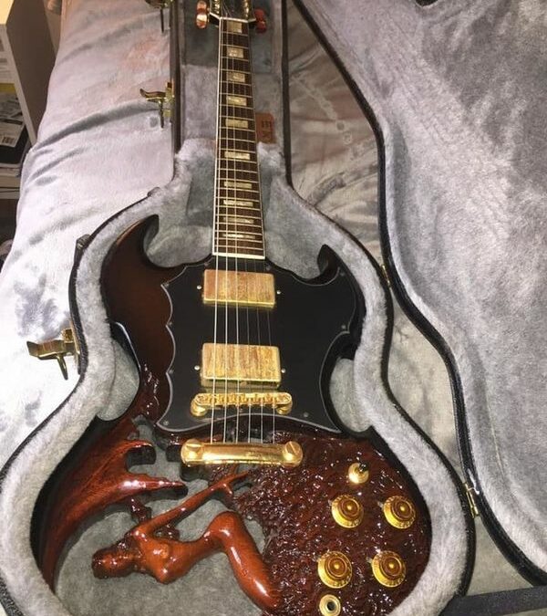 When Guitars Get Down and Dirty: The Tale of the Trapped Temptress