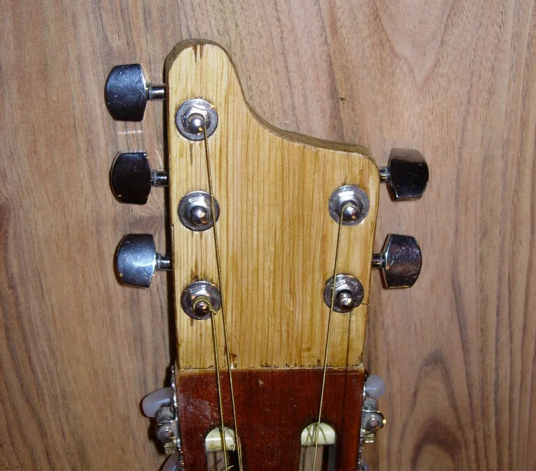 From 6 to 11: A Funny Attempt to Turn a Classic Guitar into a Doomed 12-String