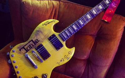 When Guitars and Toys Collide: The Headless Yellow SG Tonka Guitar