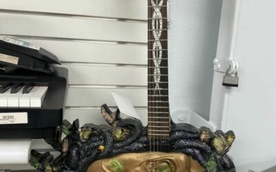 Get a Grip on the Gorgon Guitar with a Stone-Cold Stare