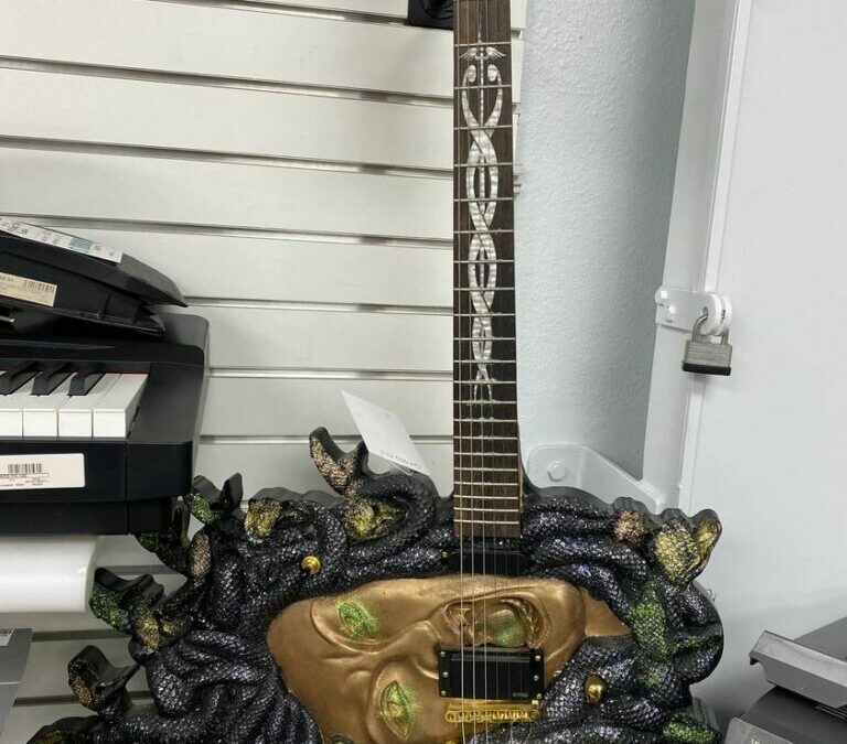 Get a Grip on the Gorgon Guitar with a Stone-Cold Stare