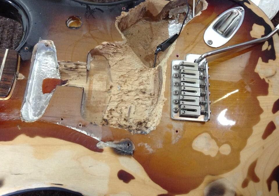 Stratocaster or Stratocrater? A Deep Dive into the Custom Guitar Cavity!